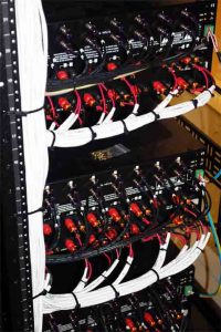 knowledge and experience - Audio / Video system equipment rack showing complex wiring neatly installed