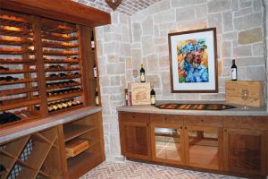 Audio - Video - Control Systems - Wine Room with ceiling speakers installed and Touchpanel control