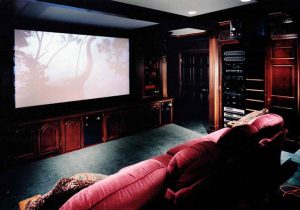 Hi-End Home Theater with JBL Studio Monitor speakers, projector, screen and A/V equipment rack Audio, Video, and Control Systems