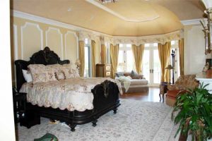 Master Bedroom with ceiling speakers installed, television with Wireless Touchpanel control for Audio, Video and Control Systems