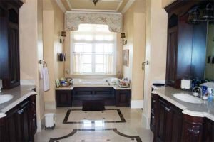 His and Hers Master Bath with 2 televisions installed behind 2-way mirrors and high-end speakers Audio, Video, and Control Systems