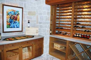 Wine Room with ceiling speakers installed and Touchpanel control in Audio, Video, and Control System