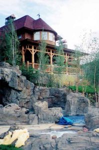 Aspen Home Outdoor Spa with Rock-Speakers installed and Touchpanel control for Audio, Video, and Control Systems