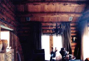 Log Home Kitchen Nook with ceiling speakers installed and whole-house A/V control