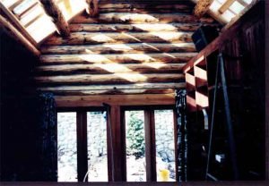 Log Home Exercise Room with high-end JBL speakers installed, whole-house A/V control