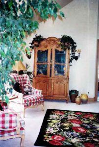 Aspen Home Sitting Area with ceiling speakers and television installed, Touchpanel control