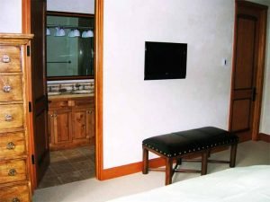 Aspen Home Guest Bedroom with ceiling speakers and television installed, Touchpanel control