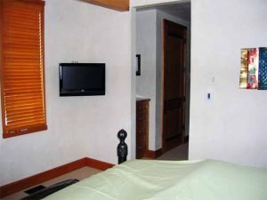 Aspen Home Guest Bedroom with ceiling speakers and television installed, Touchpanel control