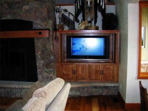 Aspen Home Great Room with ceiling speakers and television installed, Touchpanel control