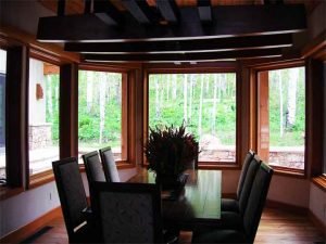 Aspen Home Dining Room with ceiling speakers installed and Touchpanel control