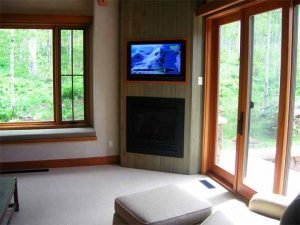 Aspen Home Master Bedroom with ceiling speakers and television installed, Touchpanel control